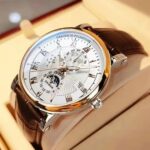 ⁦ساعة رجالية ماركة fashion بحزام جلد باللون الاسود و البني⁩ - الصورة ⁦3⁩
